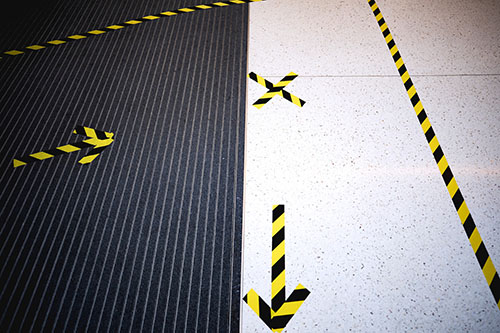 Floor markings to designate how people enter the G.G. Brown Building on North Campus of the University of Michigan in Ann Arbor, MI on May 26, 2020. Photo: Joseph Xu/Michigan Engineering