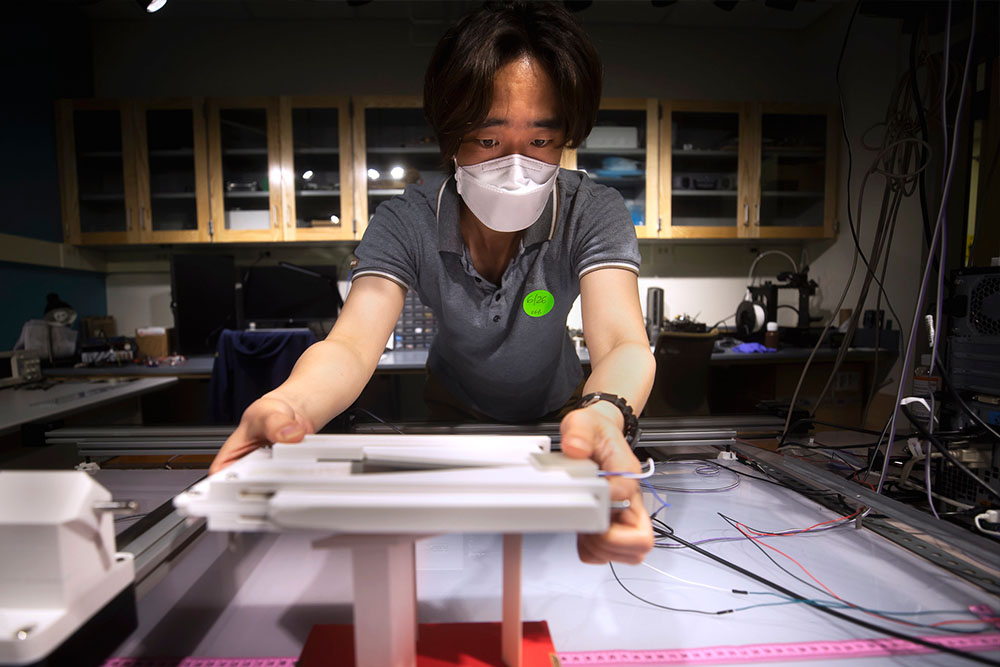 Hyung-Suk Kwon, ME PhD Student, tests the ultrasonic wave guide in the G.G. Brown Building on North Campus of the University of Michigan in Ann Arbor, MI on June 26, 2020.