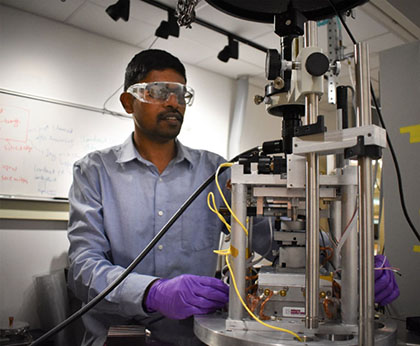 Rohith Mittapally, a PhD candidate in mechanical engineering at U-M, works on exploring thermophotovoltaic energy conversion at the nanoscale. The custom-fabricated emitter and the photovoltaic cell are aligned in a nanopositioner and the gap size is controlled with nanometric precision. The assembly is then maintained at a high vacuum and experiments are performed to measure the TPVpower output.
