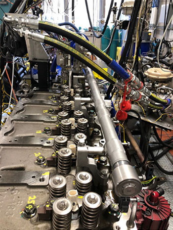 University of Michigan researchers have contributed to Volvo’s demonstration engine that will achieve a peak of  55% brake thermal efficiency, meaning high fuel efficiency.  U-M studies showed a 35% reduction in nitrogen oxides (NOx) emissions for heavy-duty trucks using extreme Miller cycle with high intake boost while enabling higher thermal efficiency.