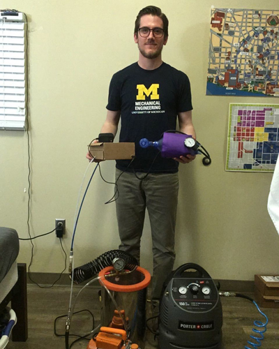 Mechanical Engineering Ph.D. student Dan Bruder with his simple ventilator design. Photo: Dan Bruder