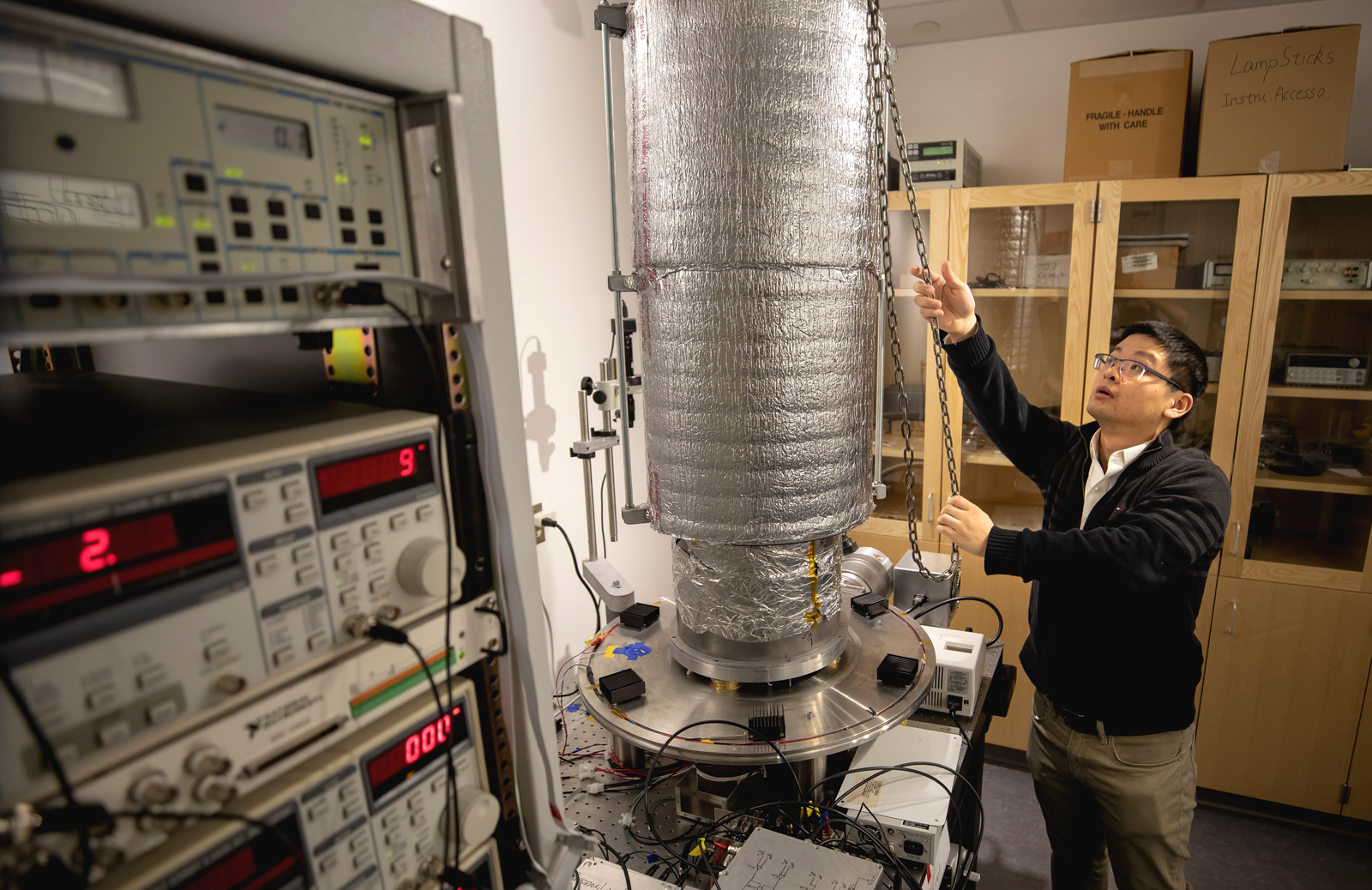 Linxiao Zhu, ME Research Fellow, unveils a device that enables cooling via heat transfer in the GG Brown Building on North Campus of the University of Michigan in Ann Arbor, MI on February 5, 2019. Photo: Joseph Xu