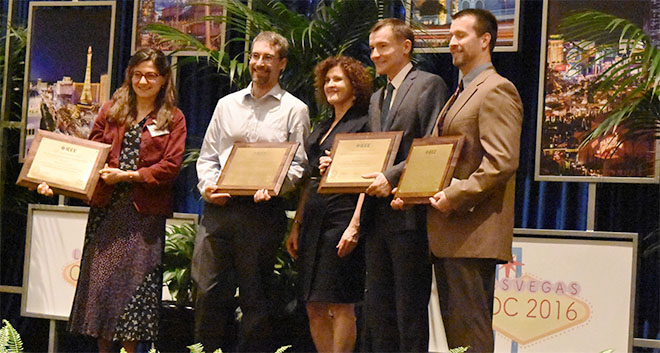 The picture shows from left Anna Stefanopoulou and Jason Siegel from University of Michigan and Aaron Knobloch and Chris Kapusta from GE Global Research receiving the award from Kristen Morris, VP of Technical Activities, IEEE Control Systems Society in the middle. Not shown were awardees; Jason Karp from GE Global Research and Dyche Anderson from Ford Motor Company