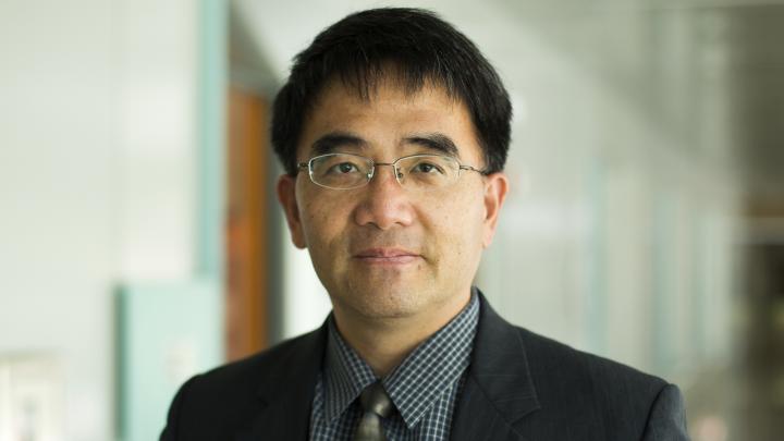 Portrait of Huei Peng, Roger L. McCarthy Professor of Mechanical Engineering.