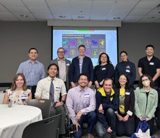 The planning team for the 2025 Disability Visibility in Engineering Symposium gathers for a group photo.